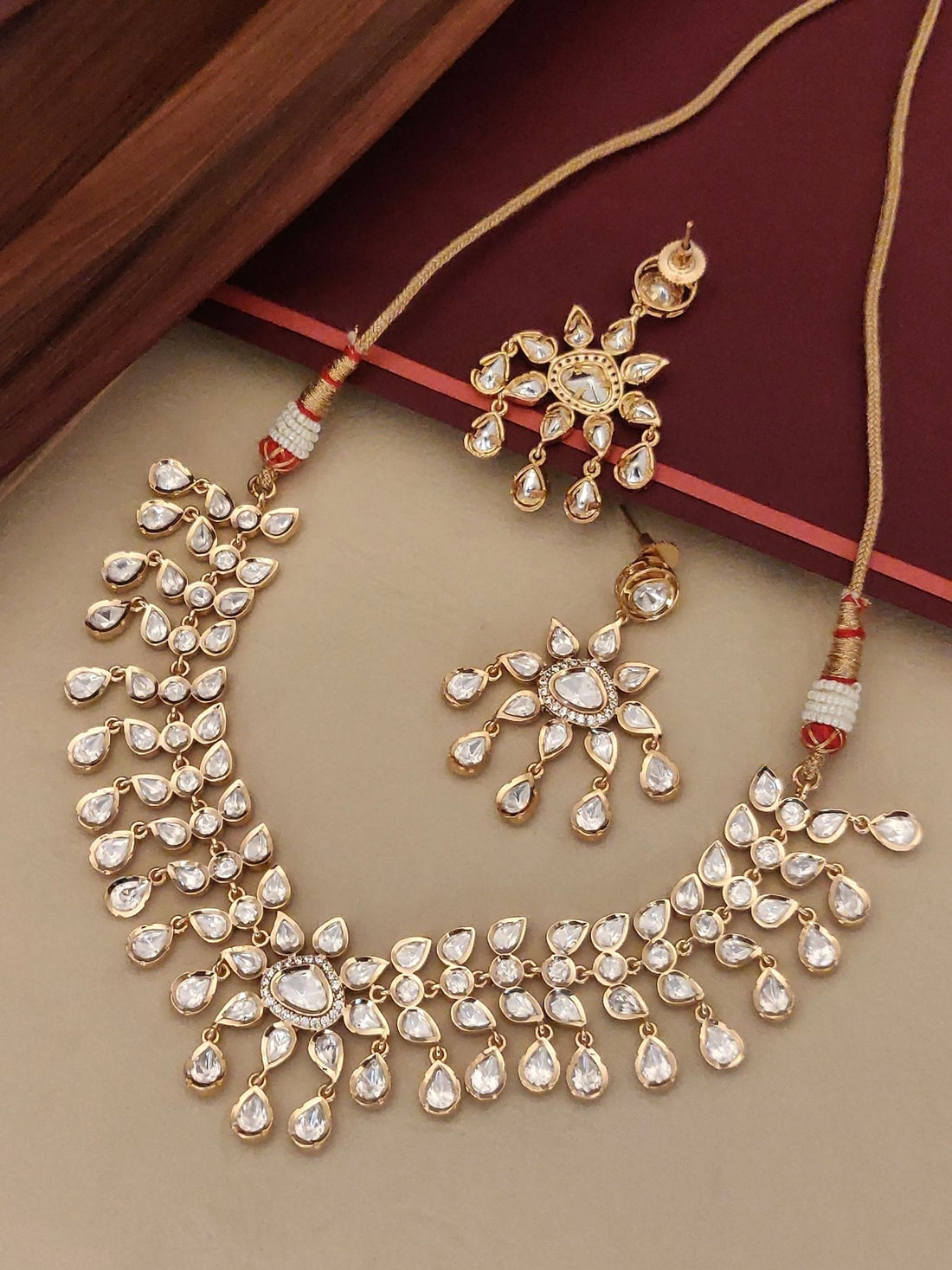 Gold Plated Polki Flower Necklace with intricate design and matching earrings for elegant occasions
