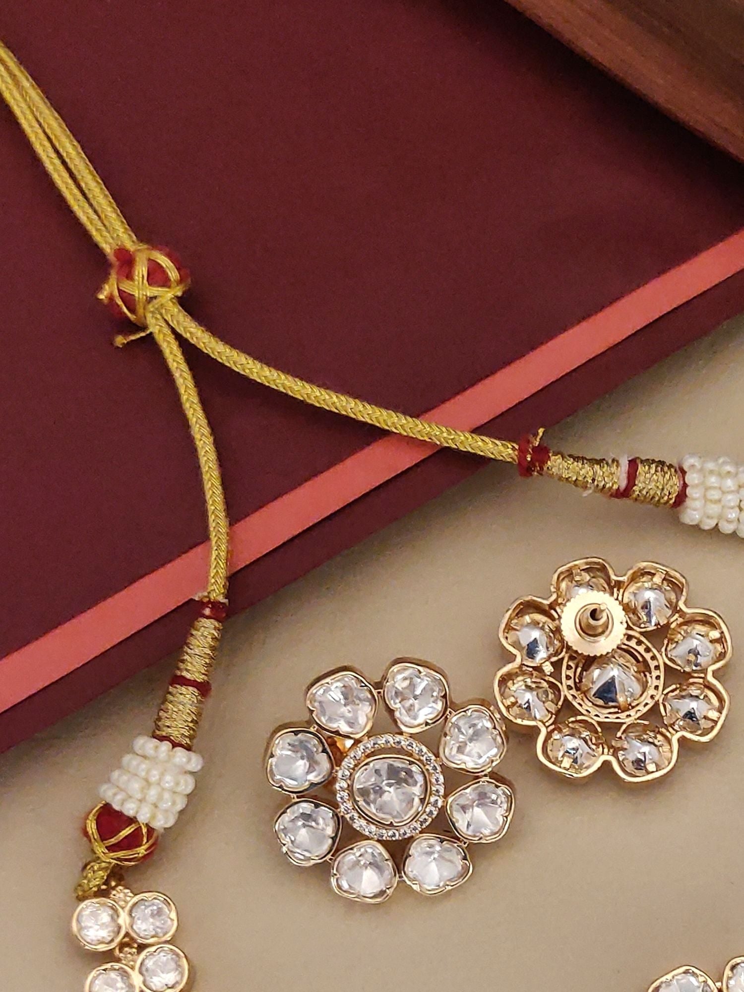 Gold Plated Polki Flower Necklace with intricate design and sparkling gemstones for elegant occasions