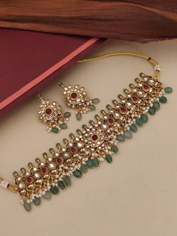 Gold Plated Polki Kundan Necklace Set with intricate designs and matching earrings, perfect for special occasions
