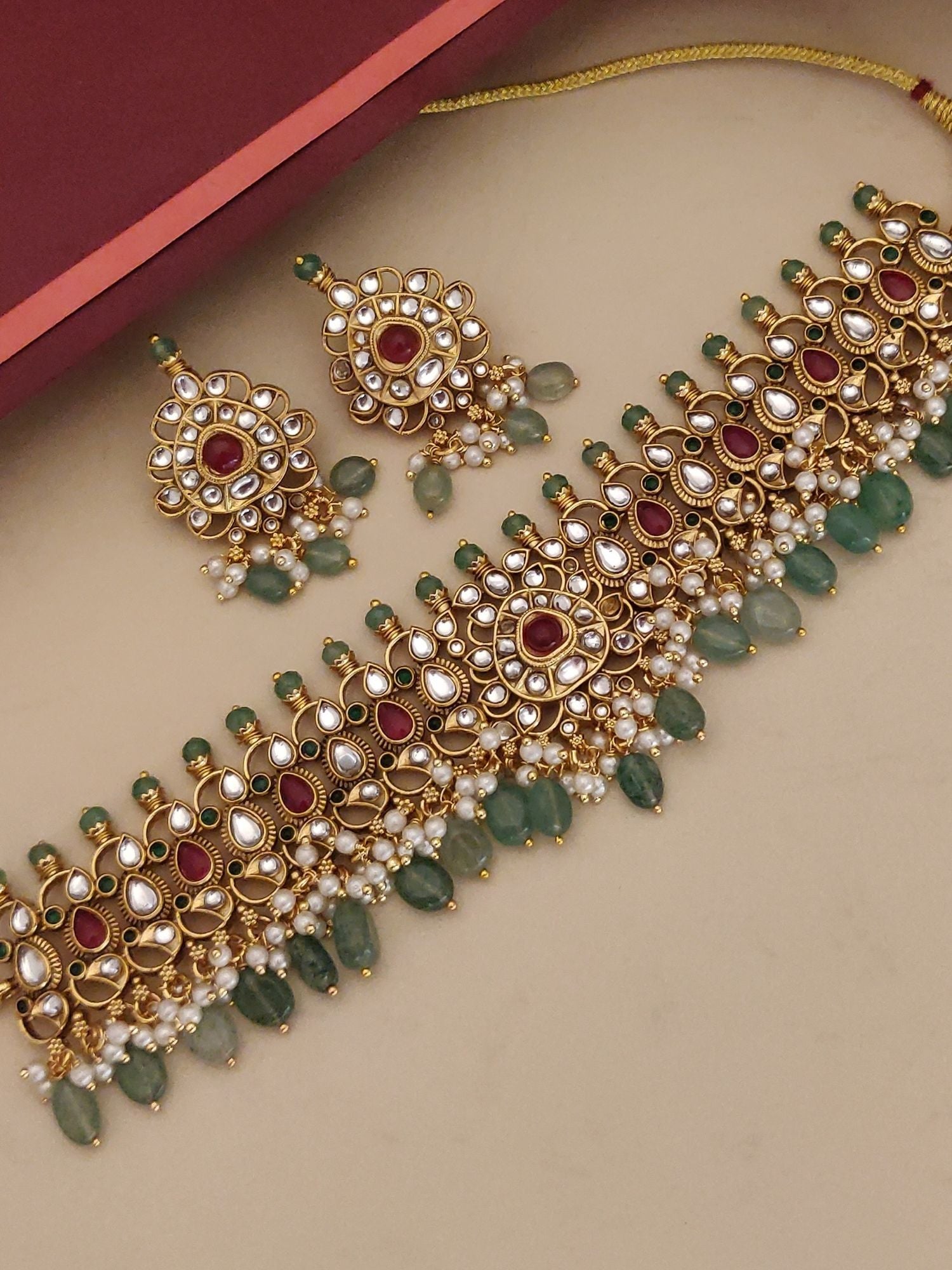 Polki Kundan Necklace Set with intricate design and matching earrings for elegant occasions