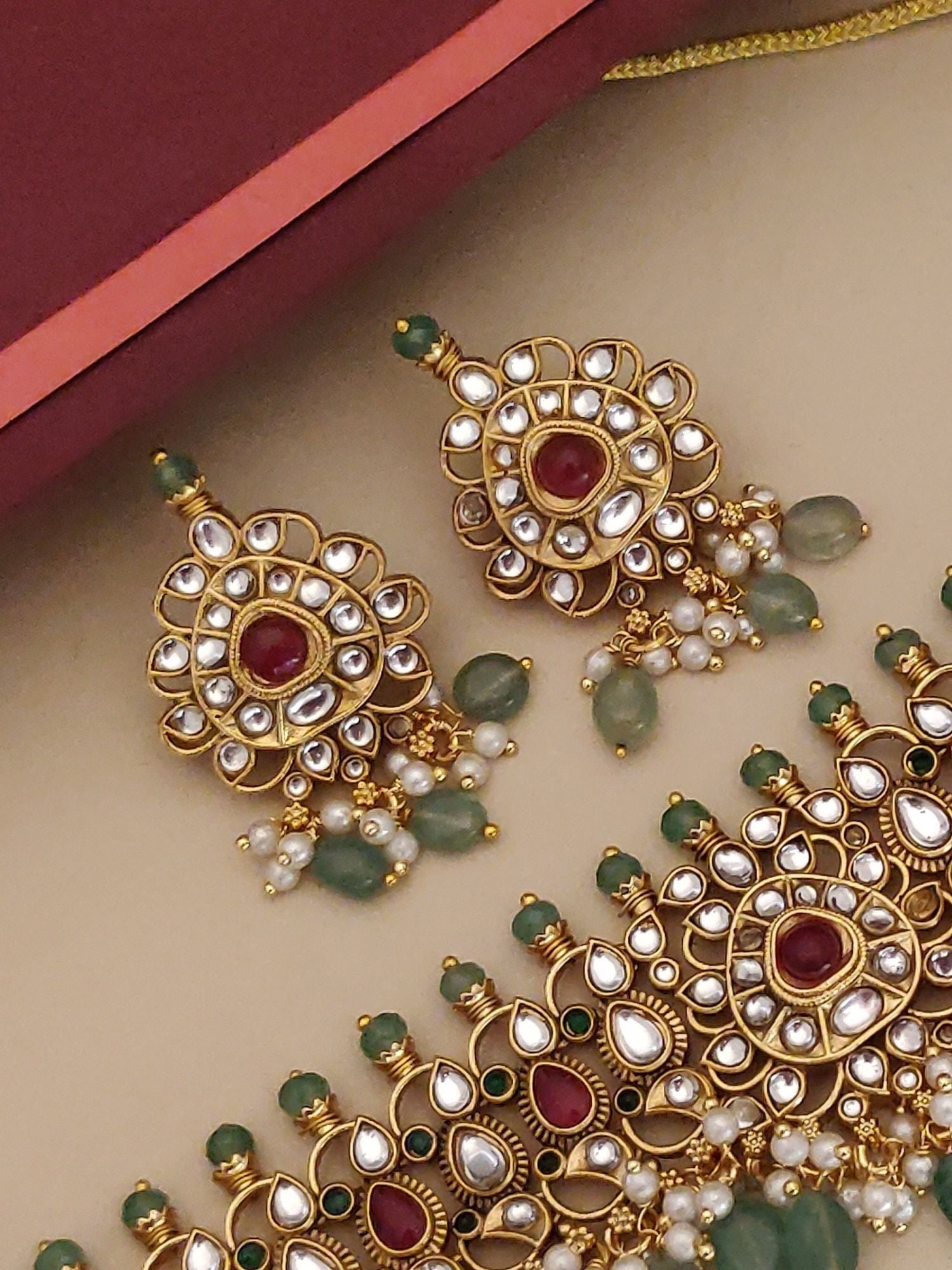 Gold Plated Polki Kundan Necklace Set with intricate design and matching earrings