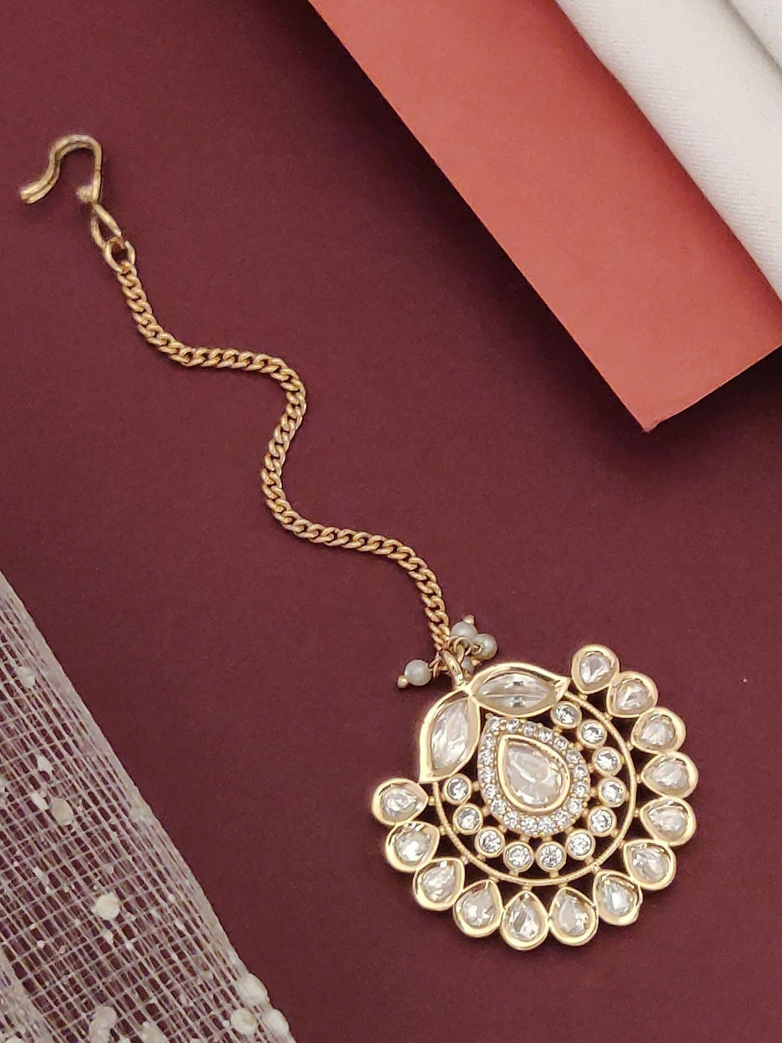 Gold Plated Polki Maangtikka with Intricate Design and Elegant Gemstones for Traditional Looks