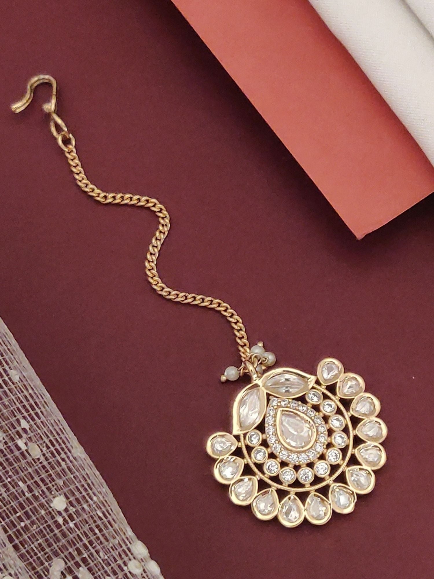 Gold Plated Polki Maangtikka with Intricate Design and Elegant Gemstones for Traditional Looks