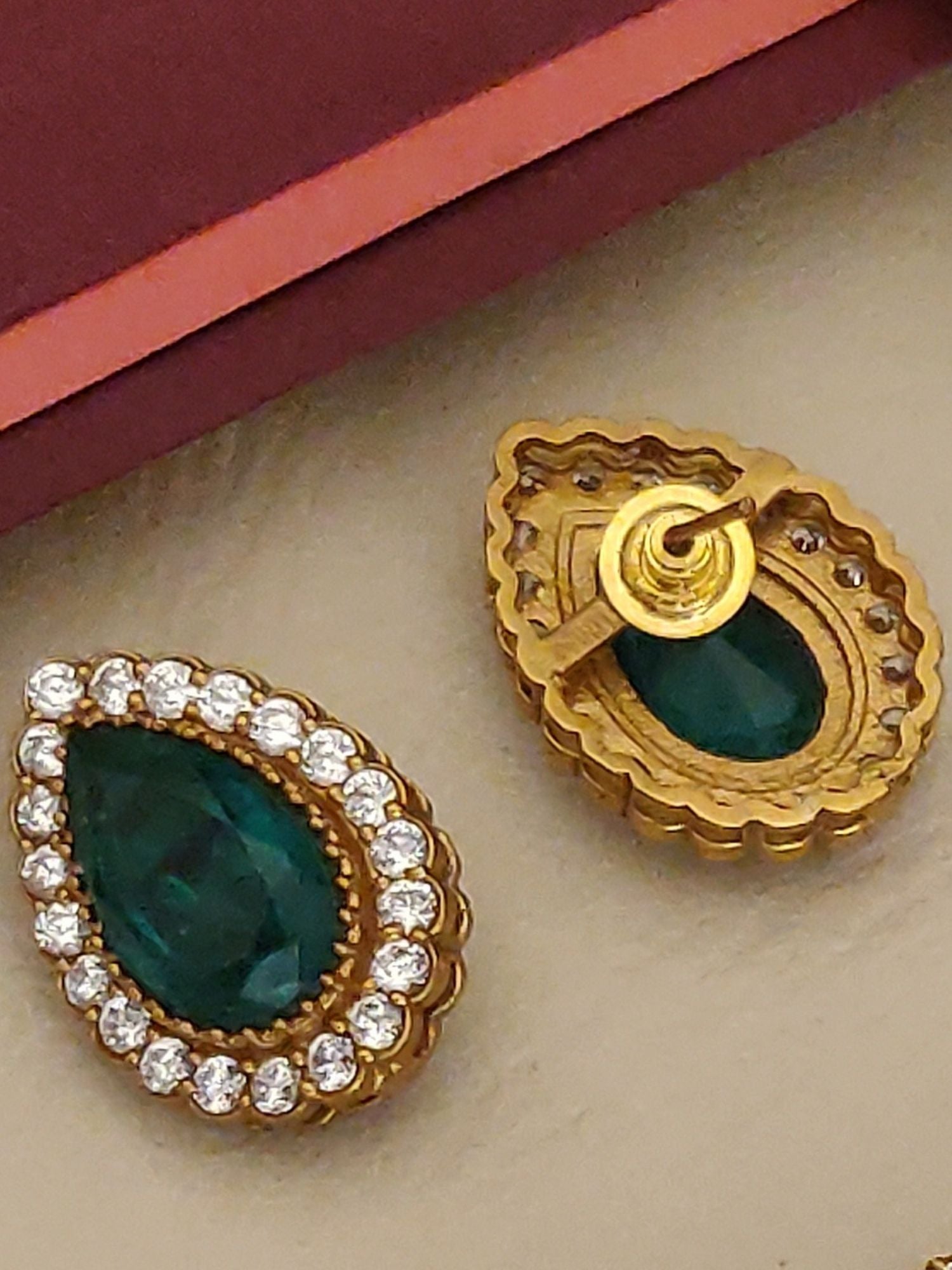 Gold plated polki necklace set featuring intricate design and sparkling stones