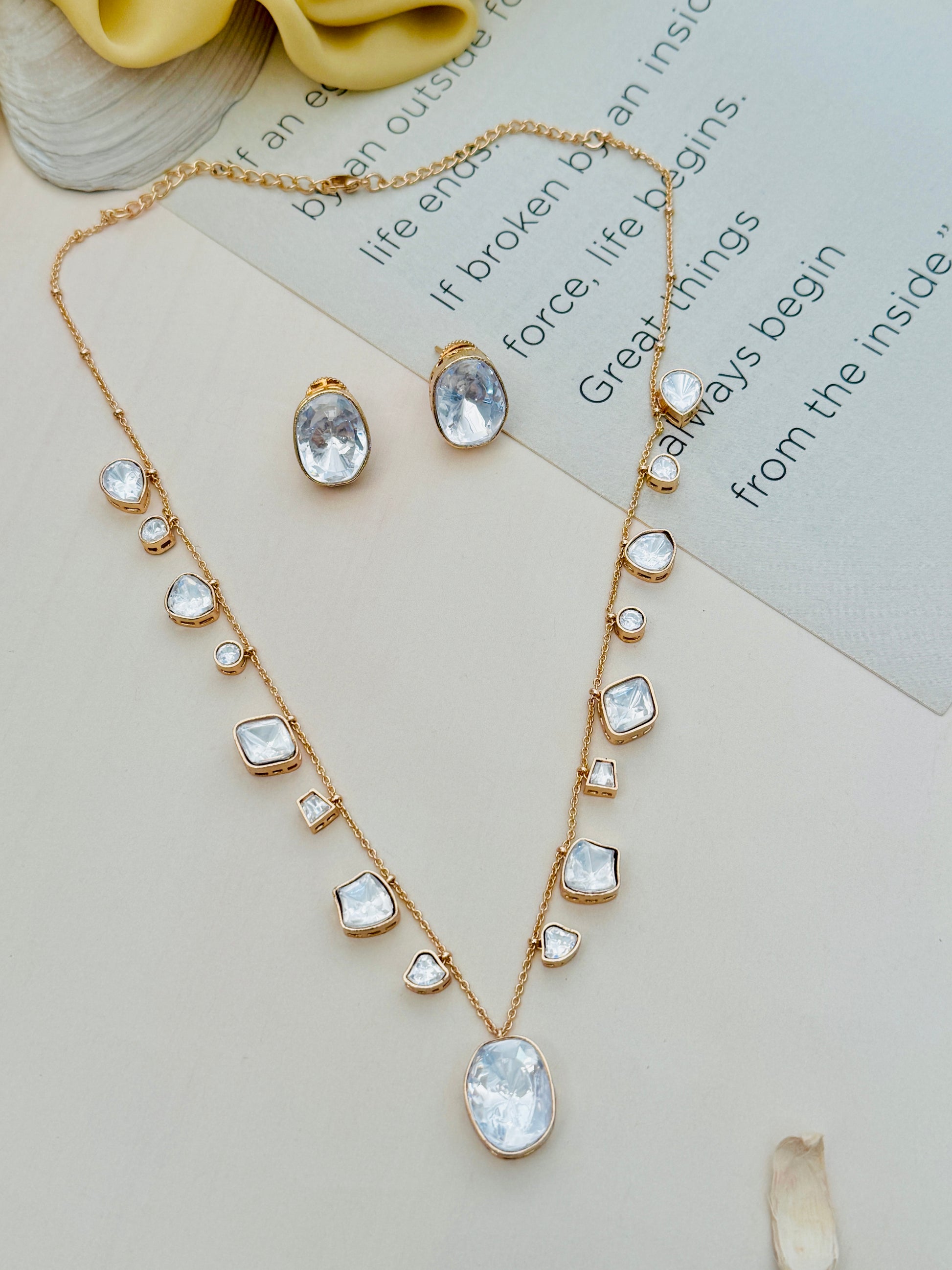 Gold Plated Polki Pendant Chain Combo by Abdesignsjewellery with clear stone embellishments and matching earrings