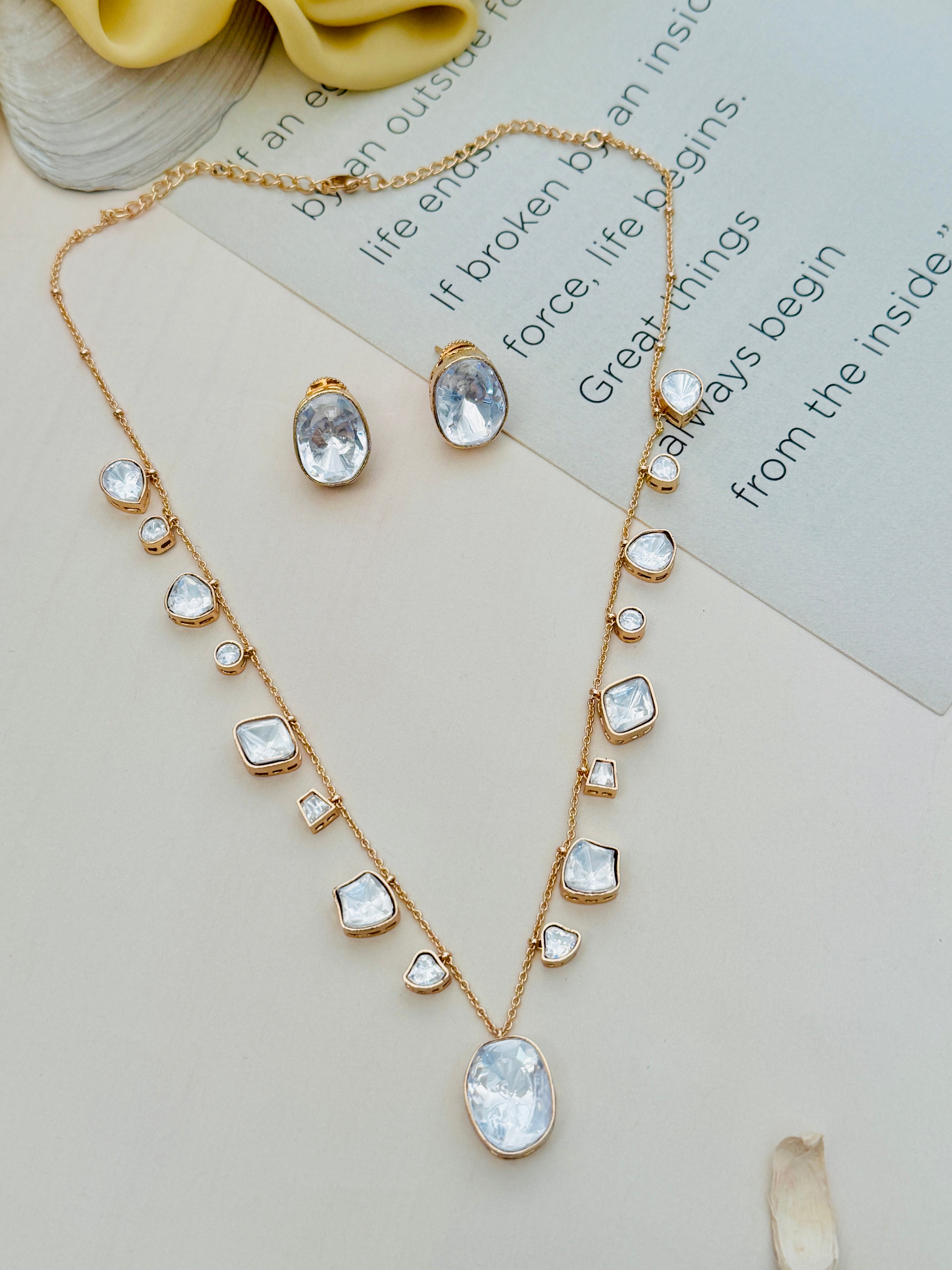 Gold Plated Polki Pendant Chain Combo by Abdesignsjewellery with clear stone embellishments and matching earrings