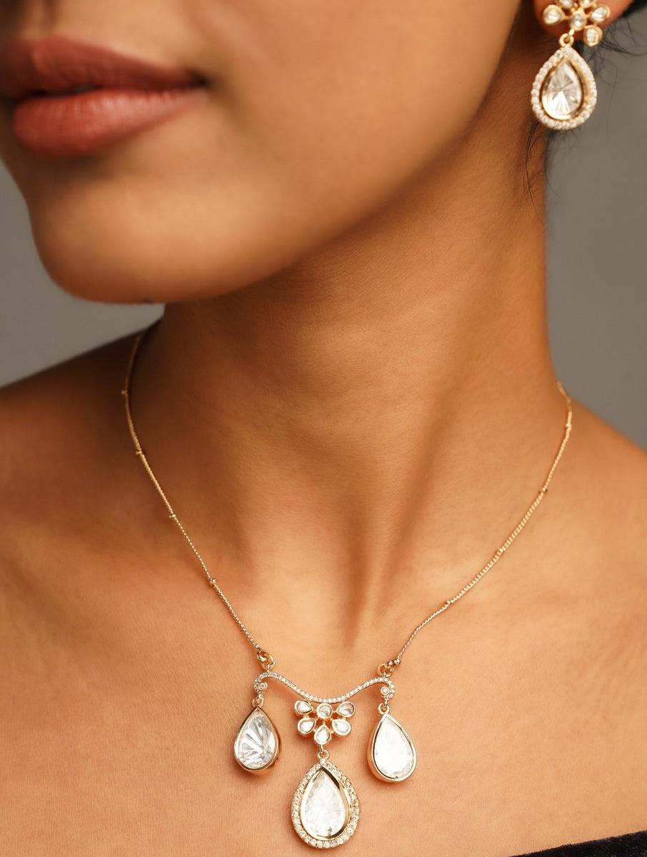 Gold Plated Polki Pendant Chain Set worn by woman with matching earrings from Abdesignsjewellery