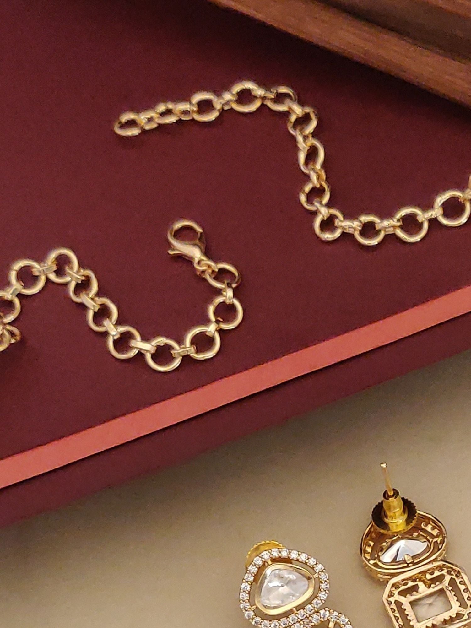 Gold Plated Polki Studed Hasli Necklace Set with intricate design and sparkling stones