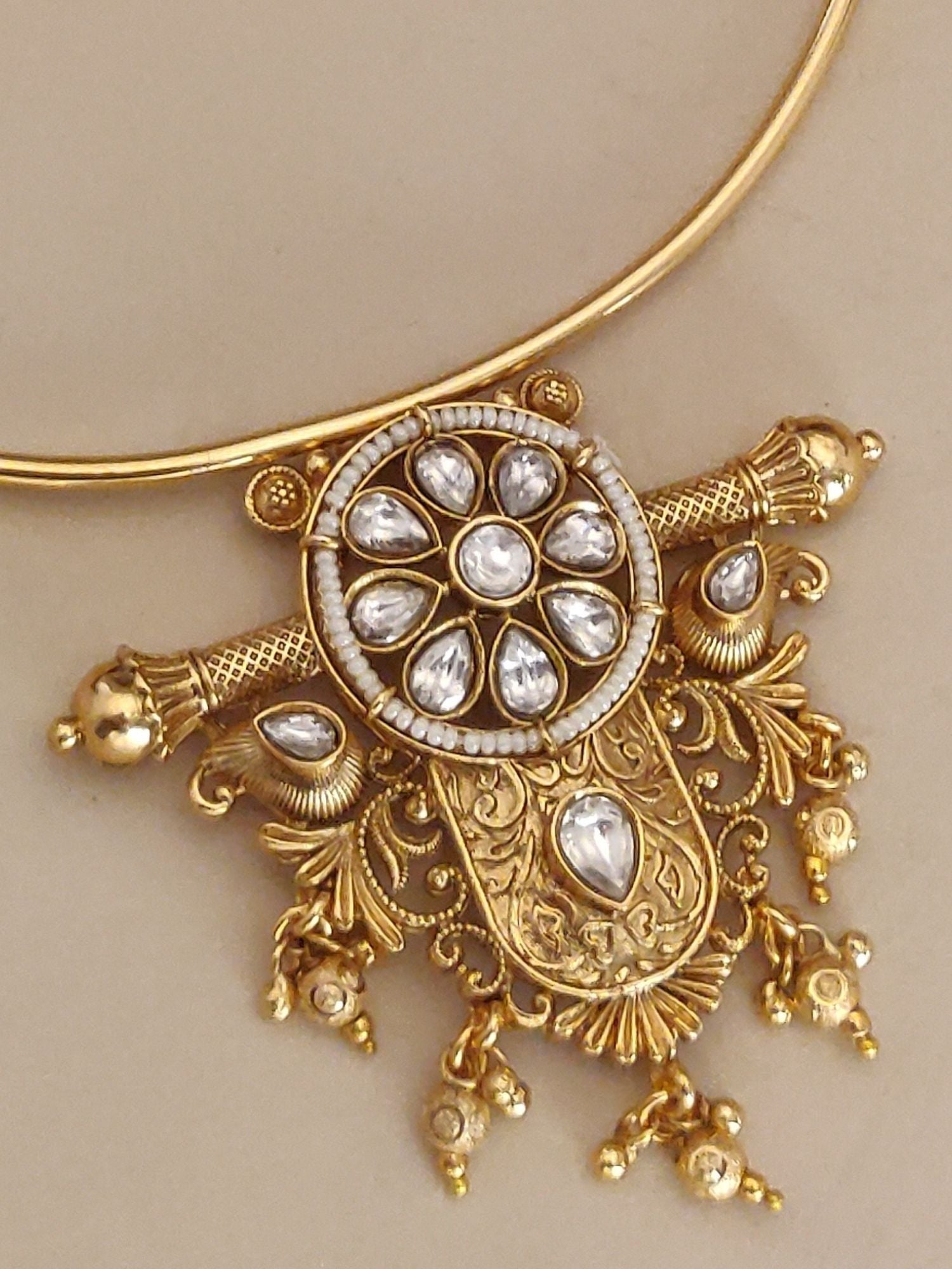 Gold Plated Polki Studed Hasli Necklace Set with intricate design and elegant embellishments