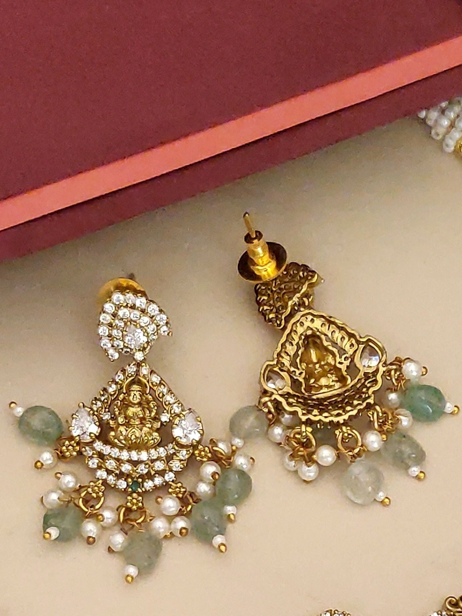 Gold Plated Temple Necklace Set featuring intricate designs and colorful gemstones