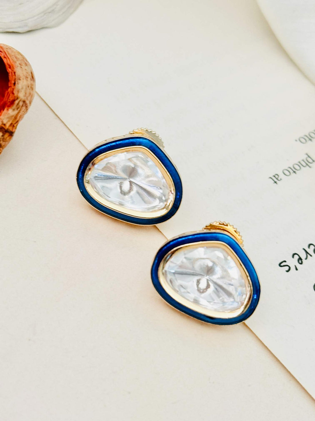 Gold Uncut Polki Diamond Stud Earrings with blue enamel border by Abdesignsjewellery