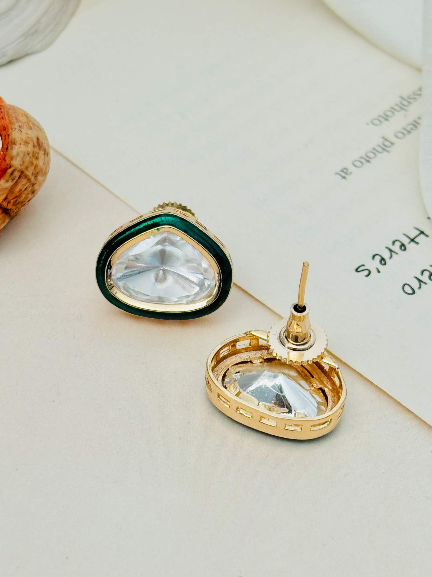 Gold Uncut Polki Diamond Stud Earrings by Abdesignsjewellery with unique triangular design and gold detailing