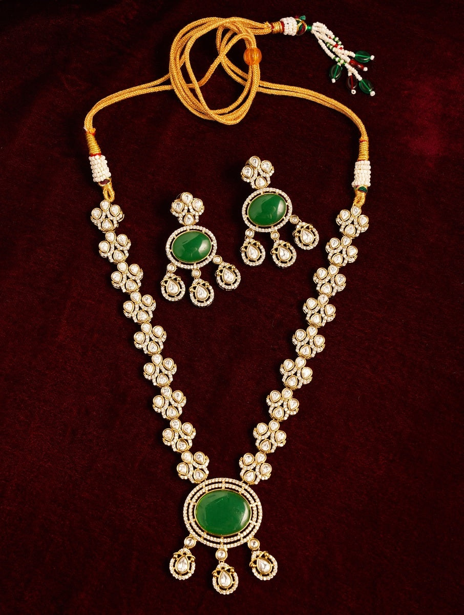 Green Emerald Polki Gold Plated Necklace Set with intricate floral designs and matching earrings by Abdesignsjewellery