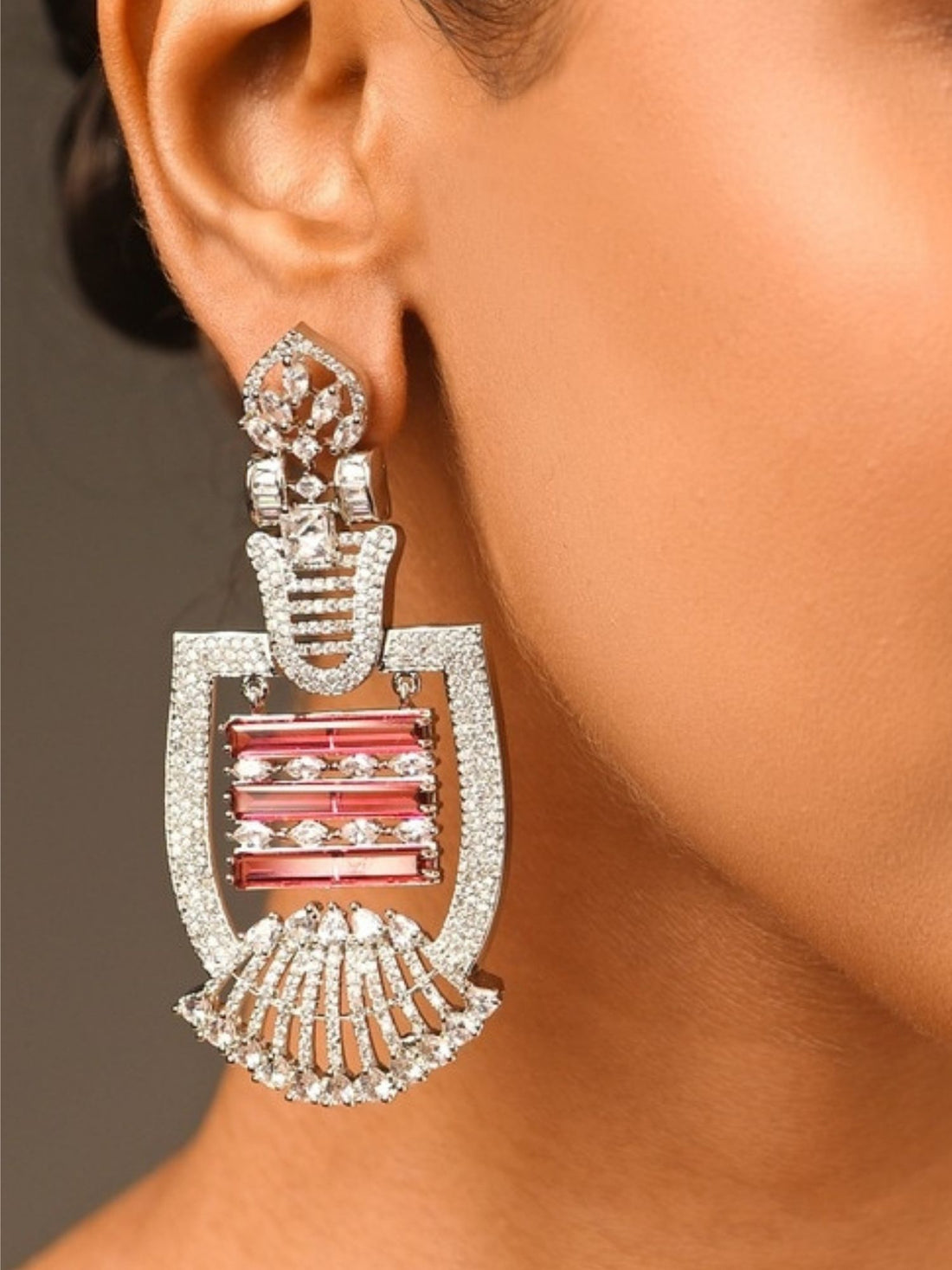Heavy Silver Plated American Diamond Earring worn by model showcasing intricate design and pink stone details