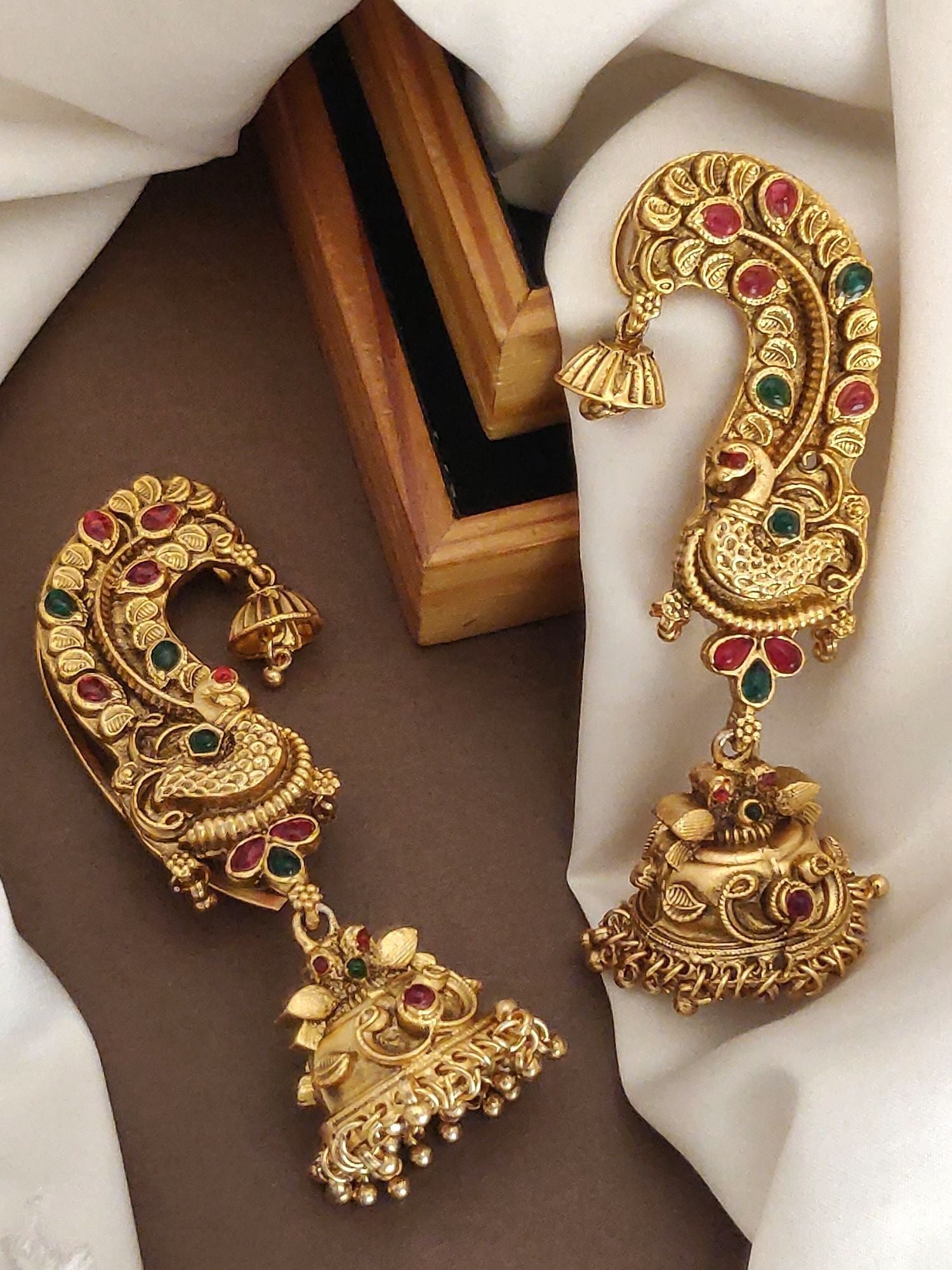 Elegant high quality ear cuff earrings with intricate peacock design and colorful gemstones