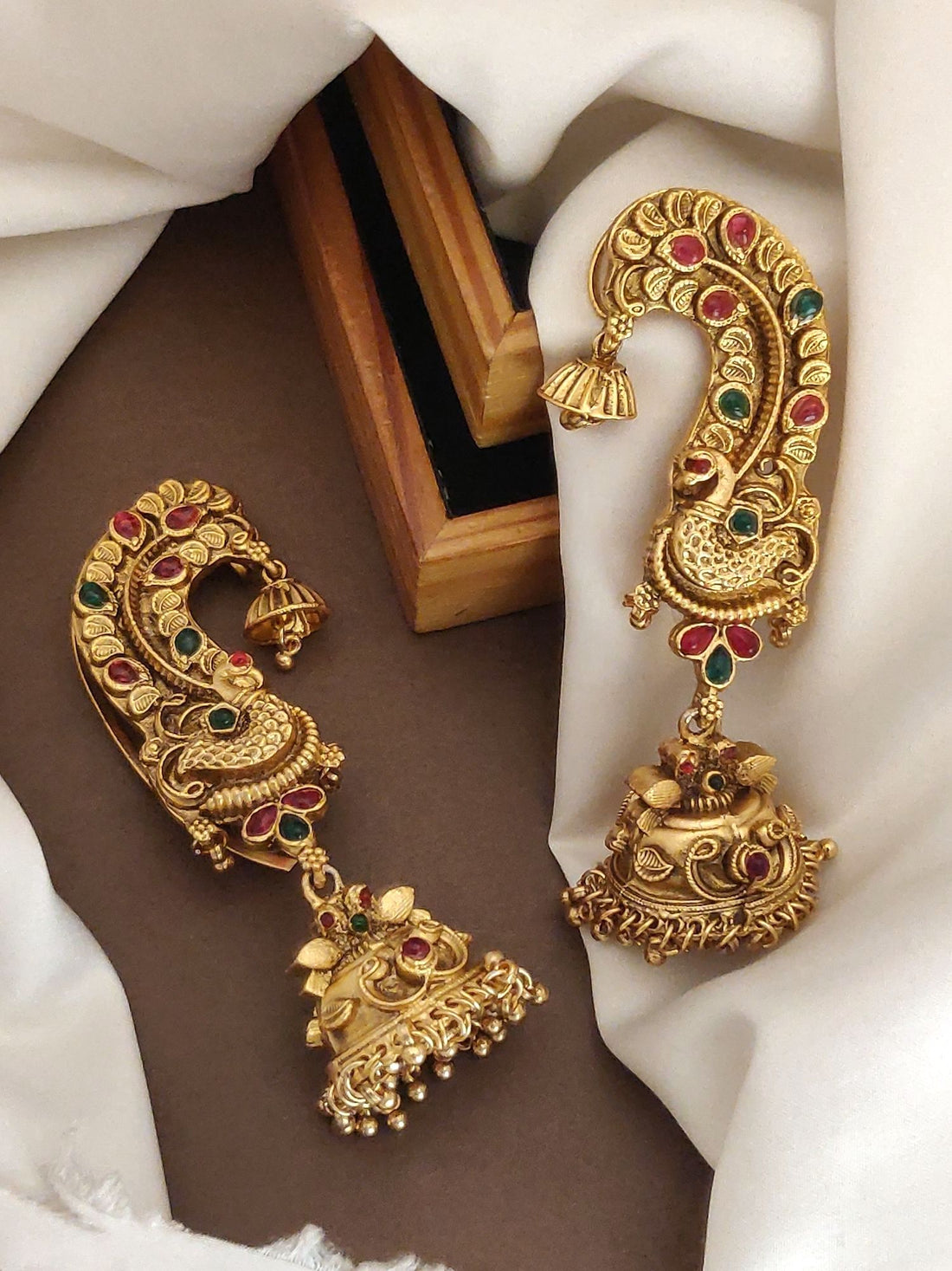 Elegant high quality ear cuff earrings with intricate gold design and colorful gemstones