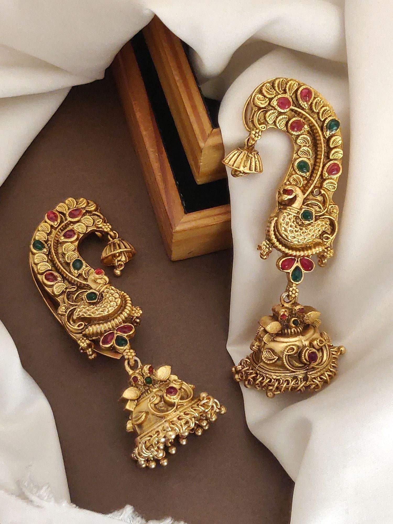Elegant high quality ear cuff earrings with intricate gold design and colorful gemstones
