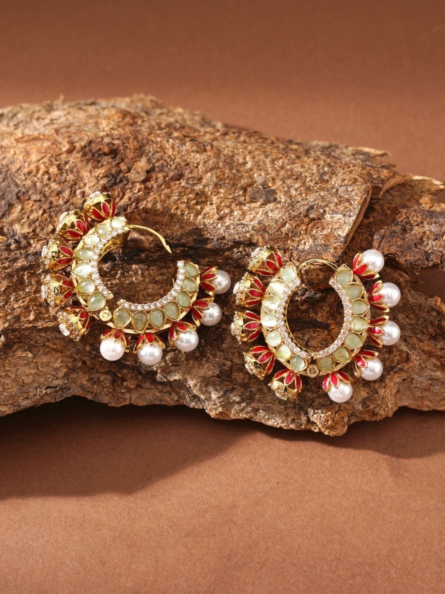 High Quality Gold Plated Artificial Stones Hoops Earrings by Abdesignsjewellery with red and white pearls on wooden background