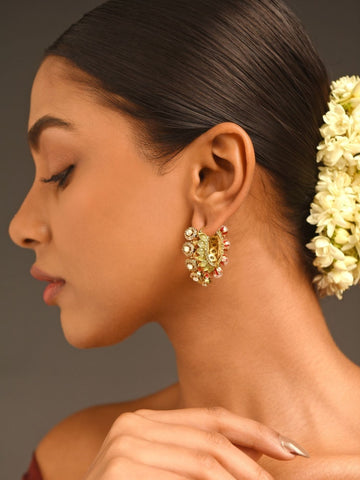 High Quality Gold Plated Artificial Stones Hoops Earrings worn by woman with sleek hair and floral adornment