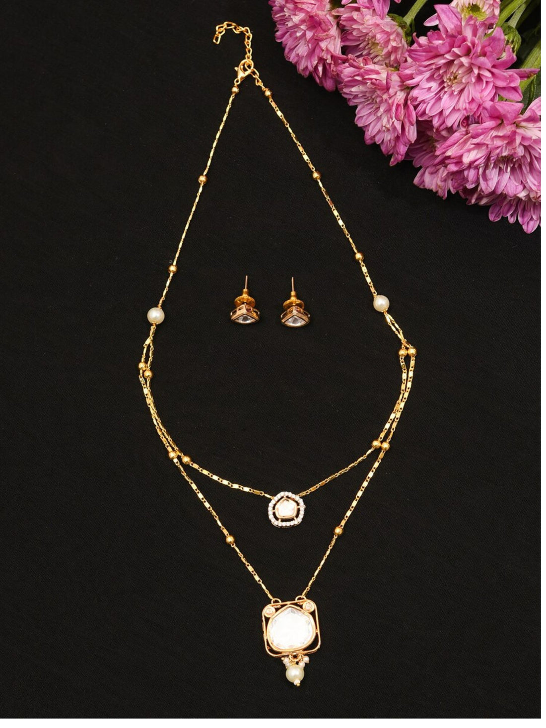 Abdesignsjewellery High Quality Polki Layered Necklace Set worn by a woman with gold tone and pearl accents