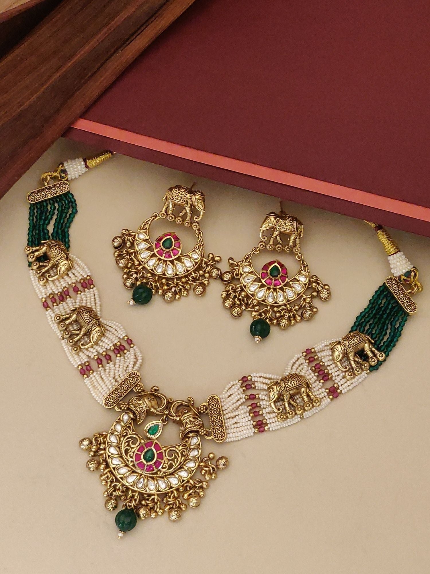 Kundan Gold Plated Necklace Set with intricate designs and matching earrings for elegant looks