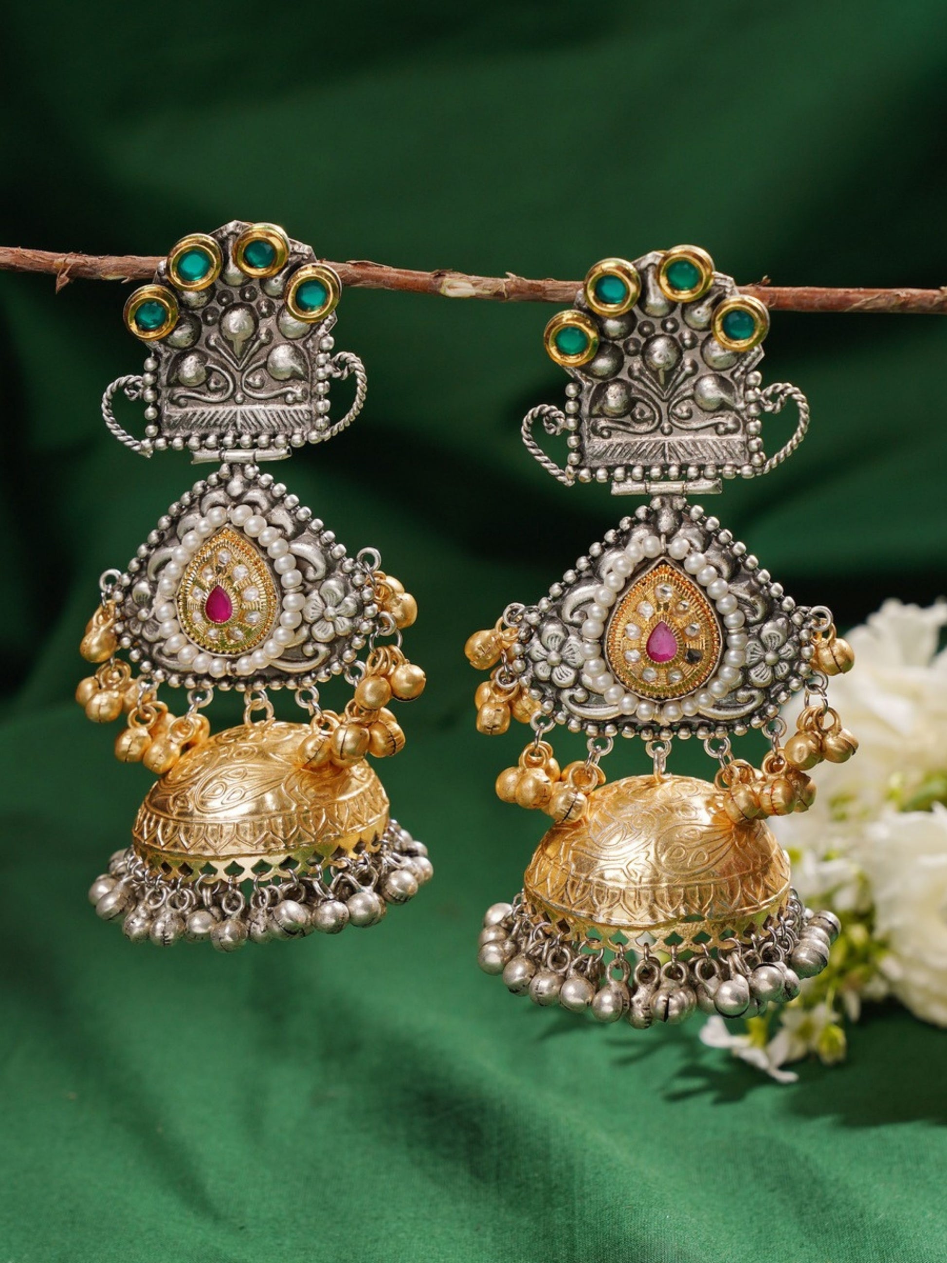 Long DualTone Plated Celebrity Style Jhumka Earrings featuring intricate silver and gold detailing with green and pink accents