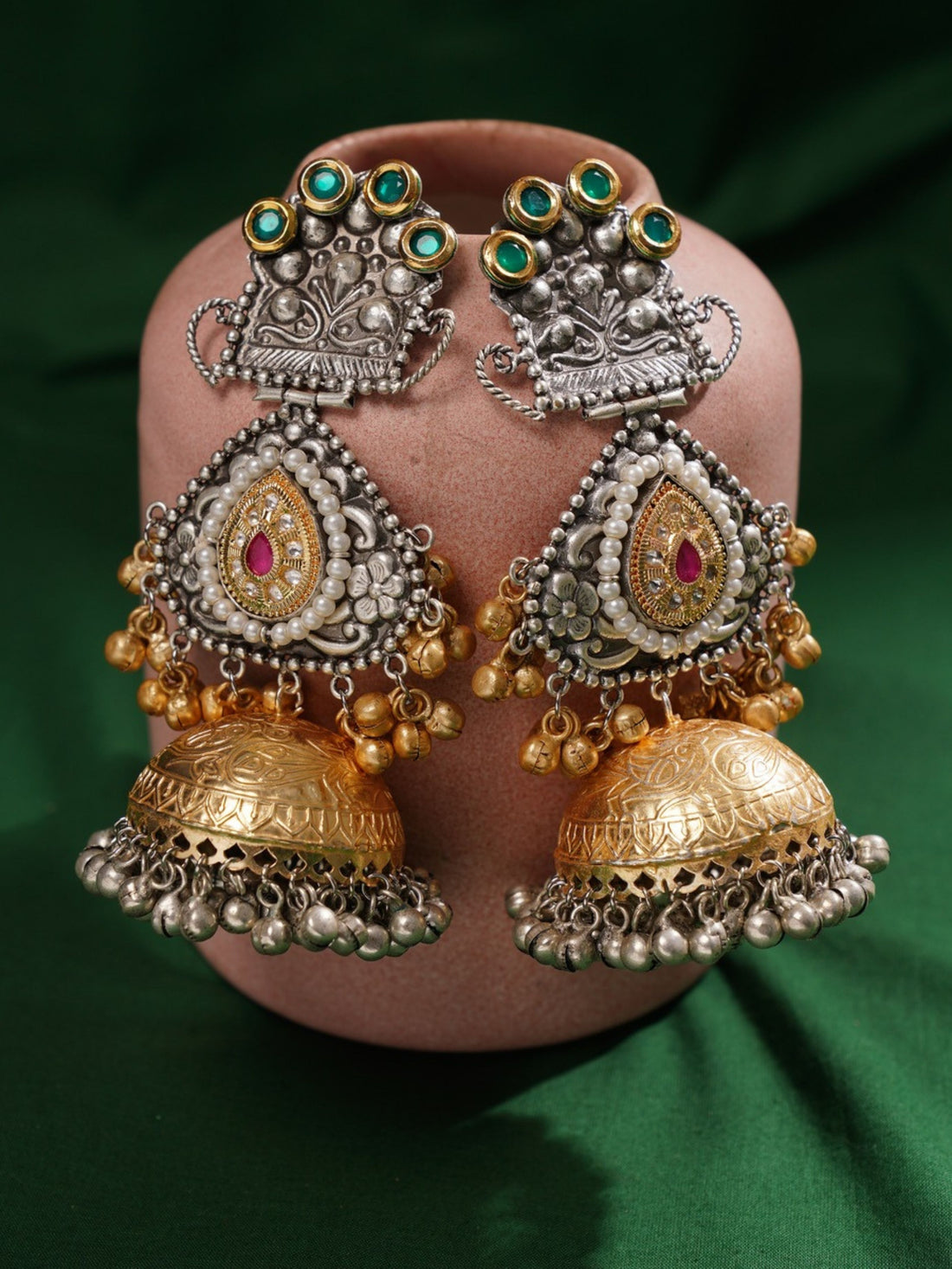 Long DualTone Plated Celebrity Style Jhumka Earrings by Abdesignsjewellery worn on woman with intricate gold and silver detailing