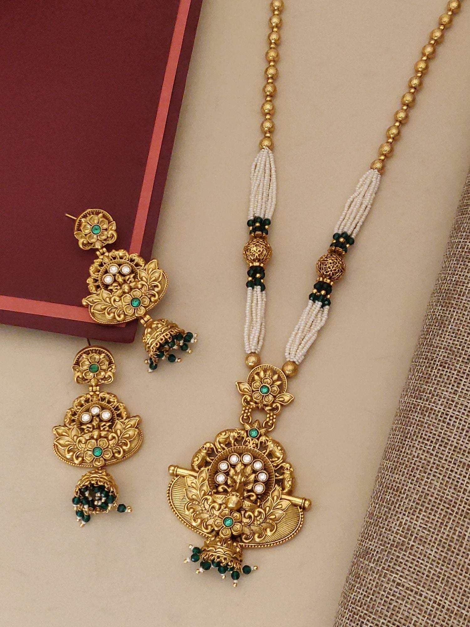 Long Gold Plated Kundan Necklace Set with intricate design and matching earrings for elegant occasions.