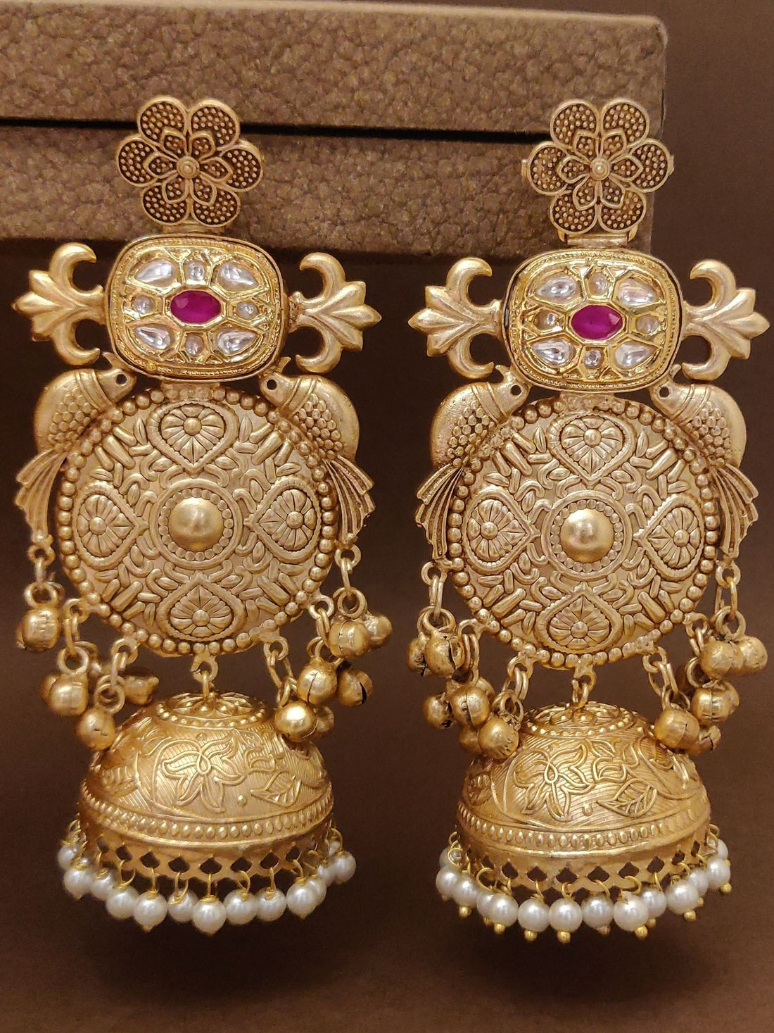 Long Matt Gold Plated Plated Jhumka Earring with intricate design and pearl accents from Abdesignsjewellery