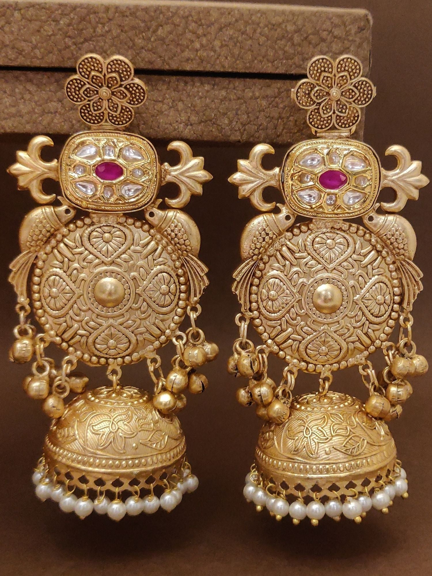 Long Matt Gold Plated Plated Jhumka Earring with intricate design and pearl details