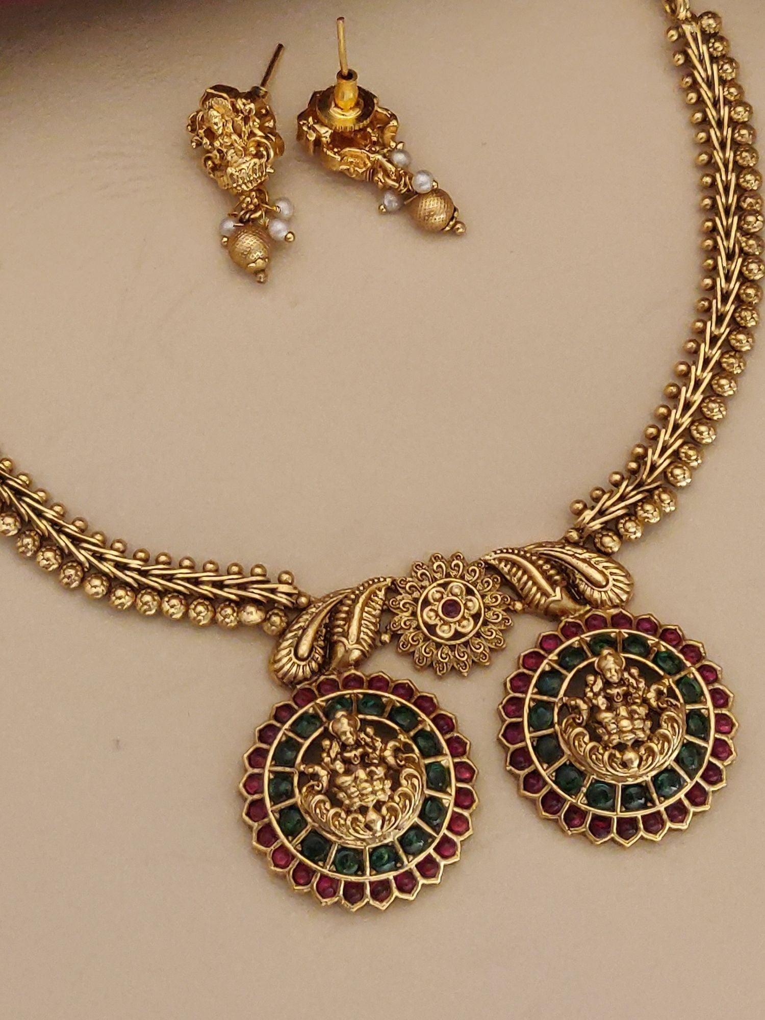 Elegant matt gold necklace for women with intricate design and matching earrings