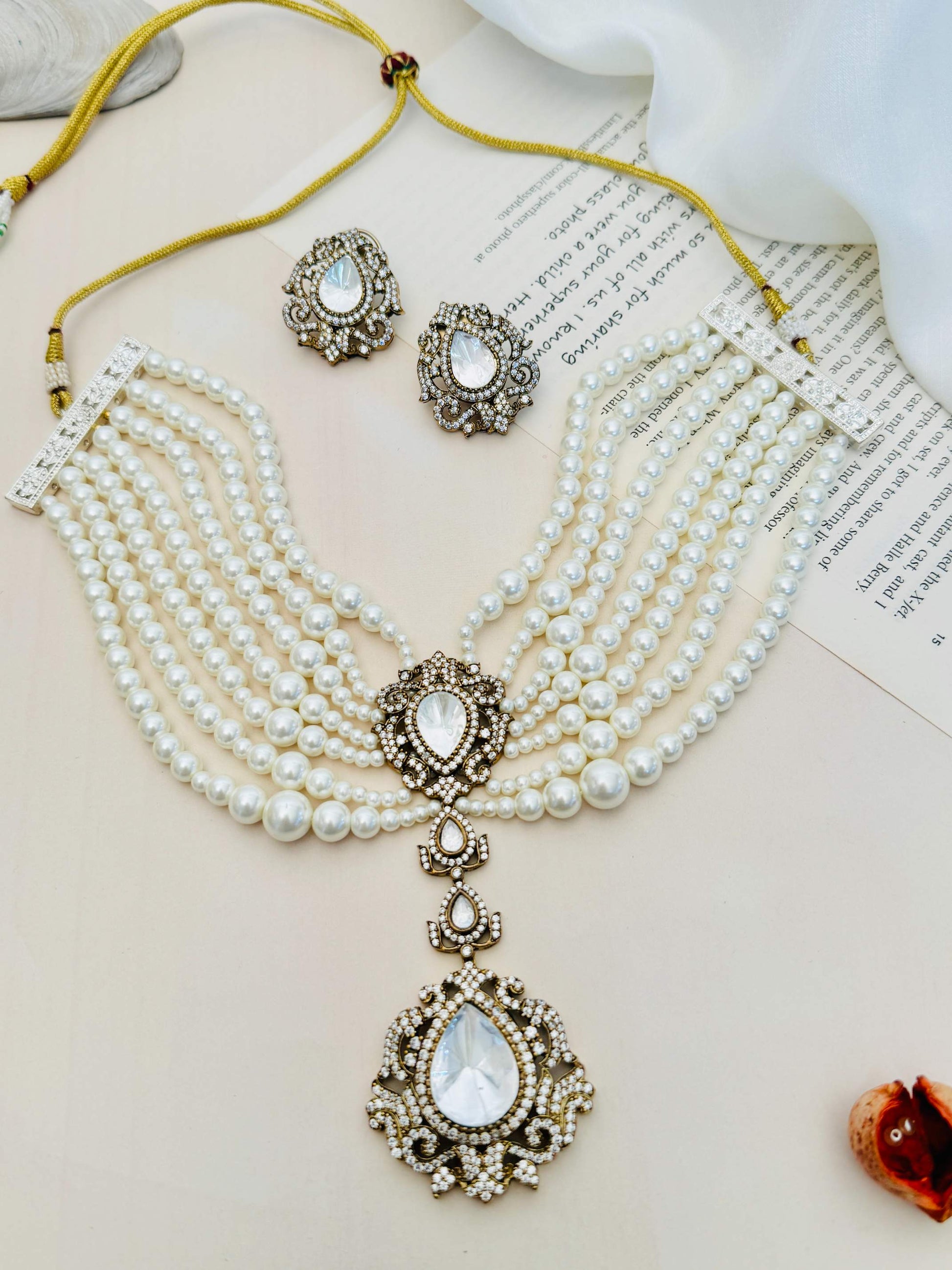 Pearl Choker Diamond Sabyasachi Necklace Set with layered pearls and matching earrings by Abdesignsjewellery