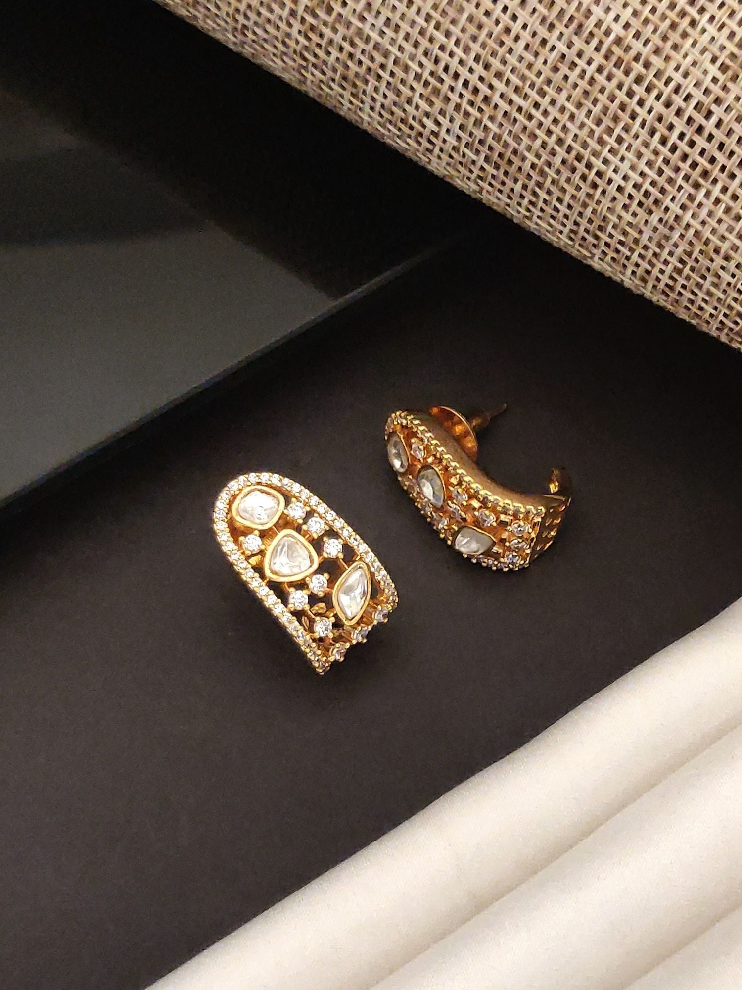 Gold tone Polki Diamond Stud Earring with intricate stone detailing by Abdesignsjewellery