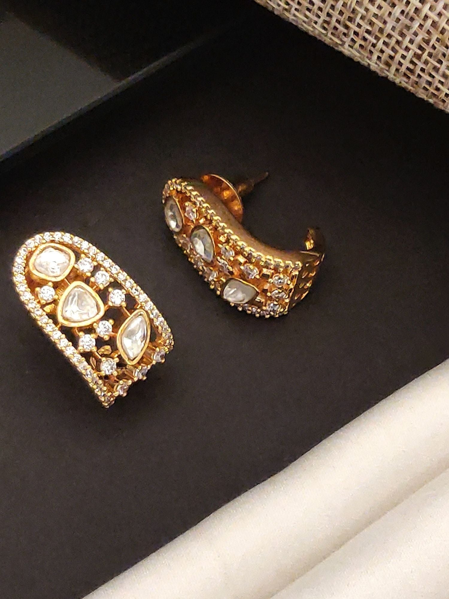Polki Diamond Stud Earring set with gold base and intricate stone detailing by Abdesignsjewellery