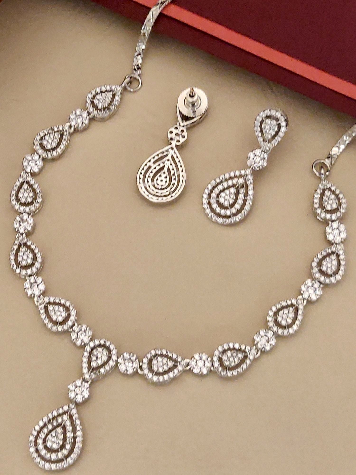 Elegant Premium American Diamond Necklace Set with intricate teardrop designs and matching earrings
