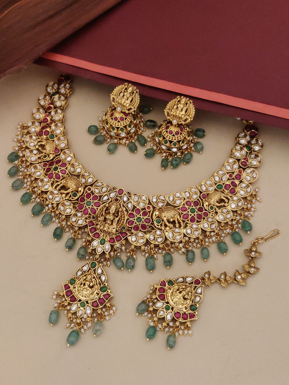 Rajwadi Style Bridal Gold Plated Necklace Set featuring intricate designs and vibrant colors with matching earrings