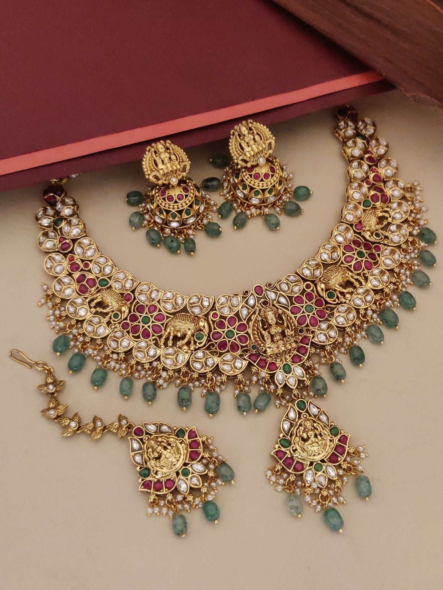 Rajwadi Style Bridal Gold Plated Necklace Set featuring intricate designs and vibrant colors with matching earrings