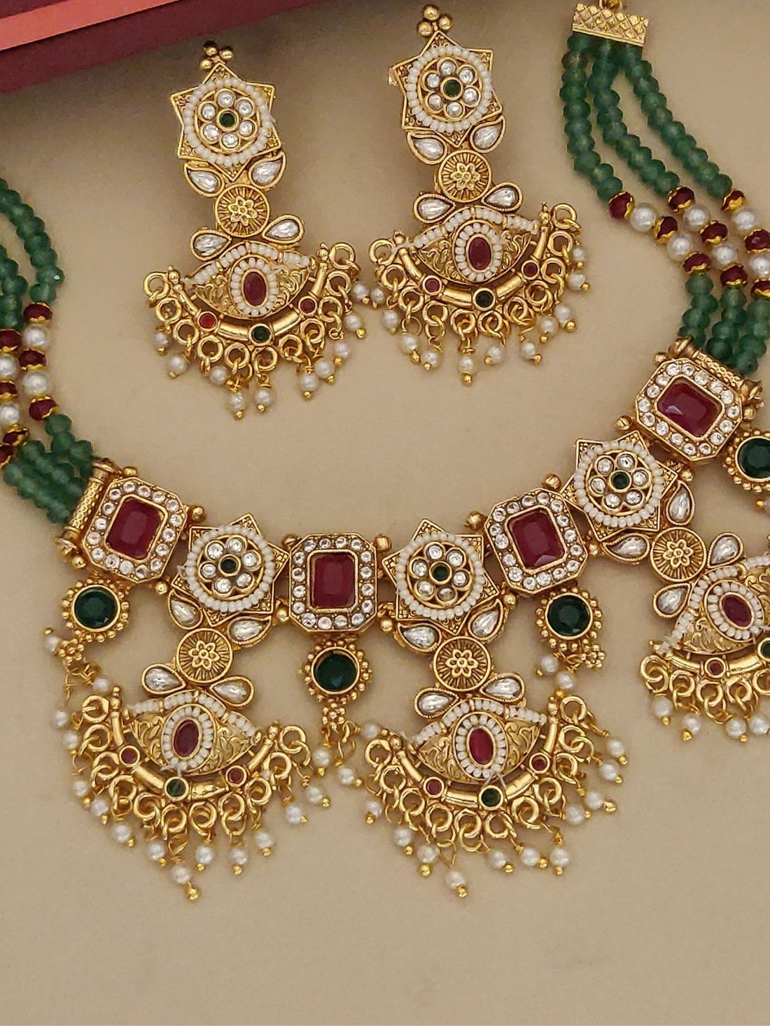Rajwadi Style Gold Plated MultiColour Stone Necklace Set with intricate patterns and matching earrings