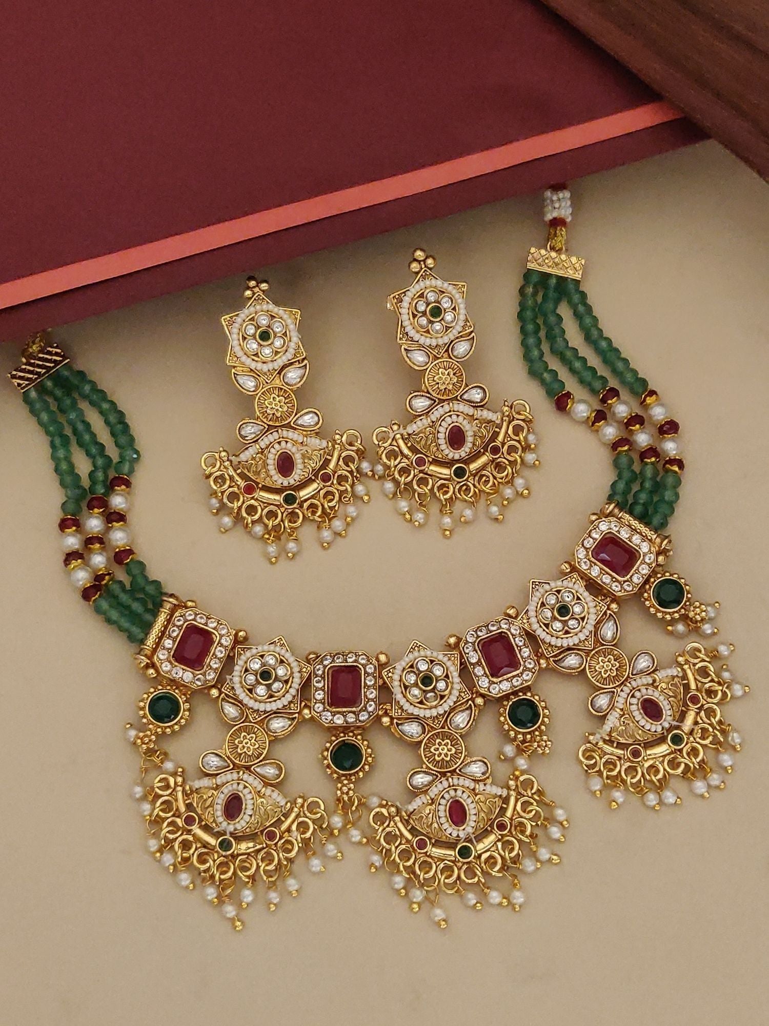 Rajwadi Style Gold Plated MultiColour Stone Necklace Set with intricate patterns and matching earrings