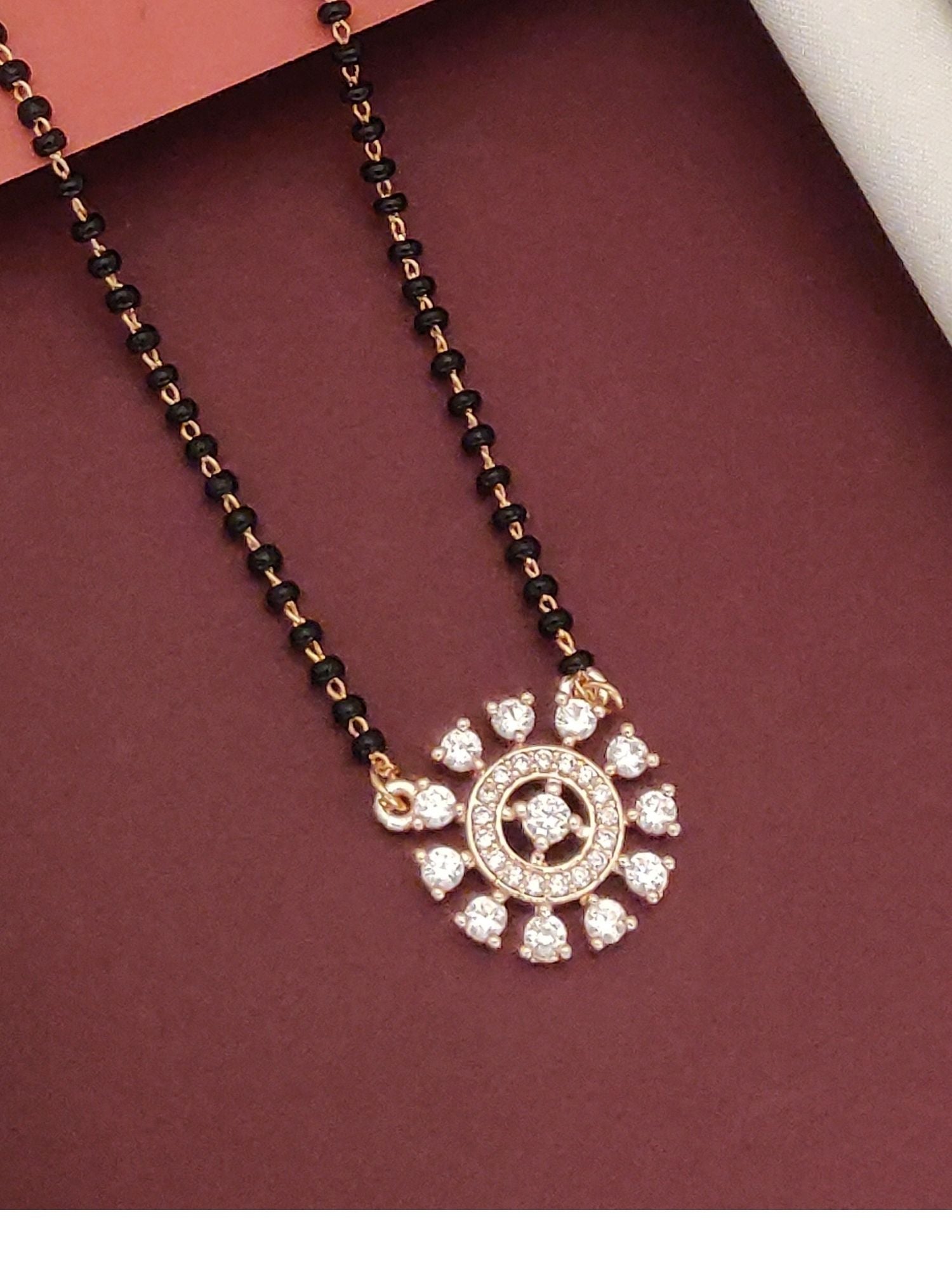 Abdesignsjewellery rose gold plated diamond mangalsutra with black beaded chain and circular floral pendant