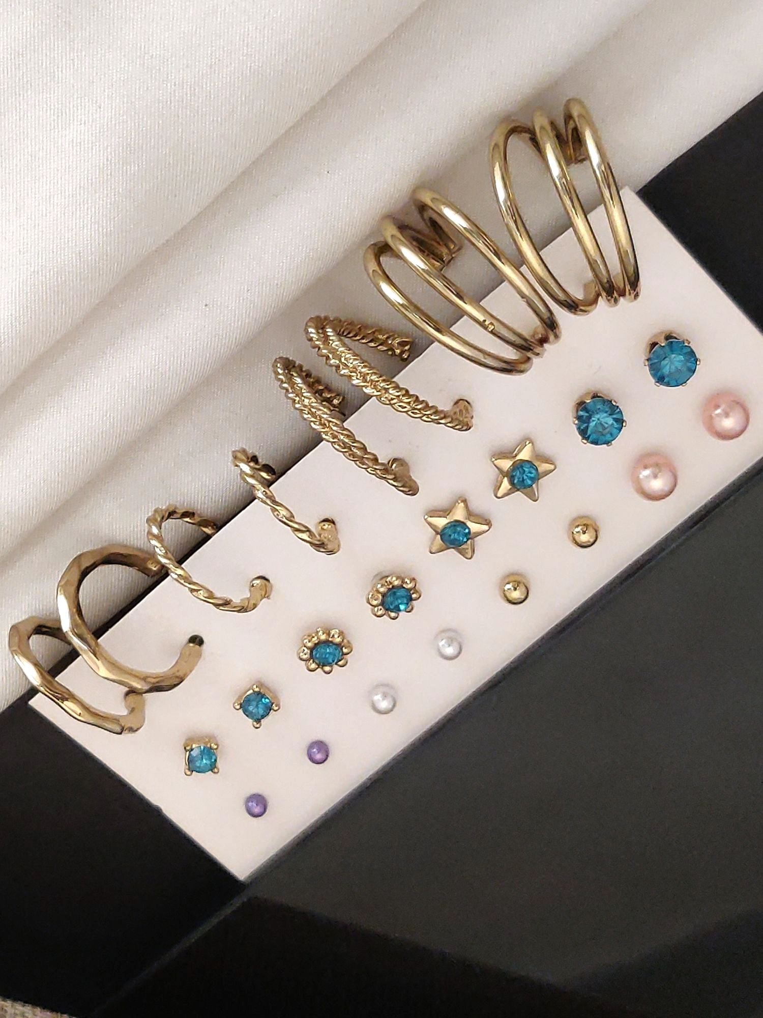 Set of 12 Gold Plated Hoops Earring Combo featuring various designs and colors for versatile styling