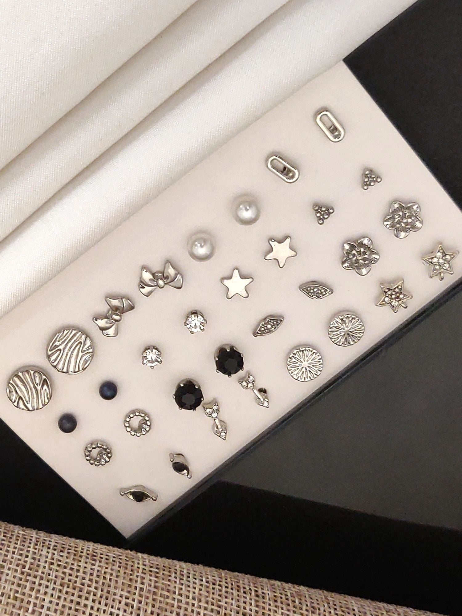 Set Of 16 Silver Plated Western Studs Earring Combo featuring various designs on a display card