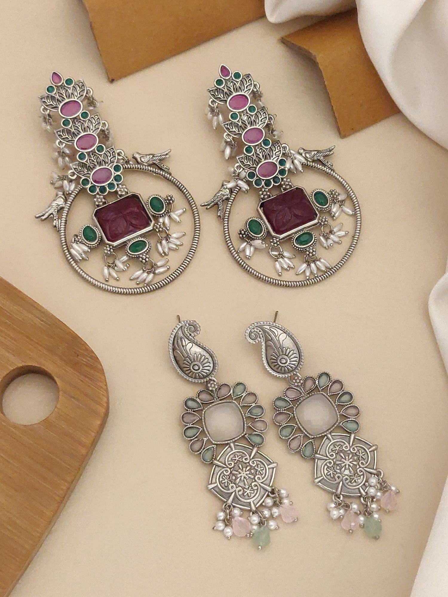 Set of 2 German Silver Earring Combo featuring intricate designs with colorful gemstones