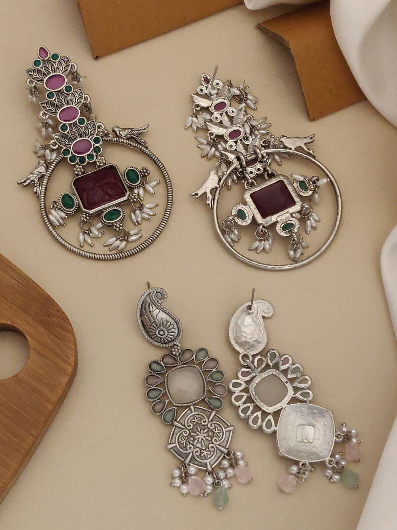 Set of 2 German Silver Earring Combo with intricate designs, gemstones, and elegant hanging details