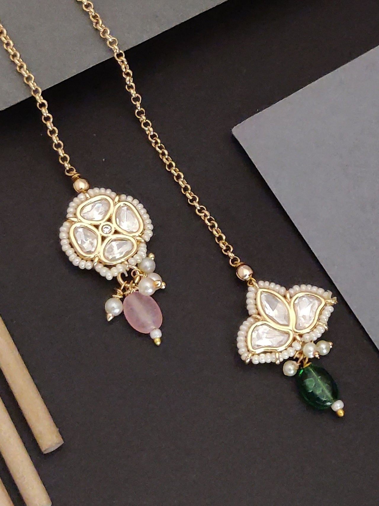 Set Of 2 Gold Plated Kundan Maangtikka with colorful stones and intricate designs for elegant styles