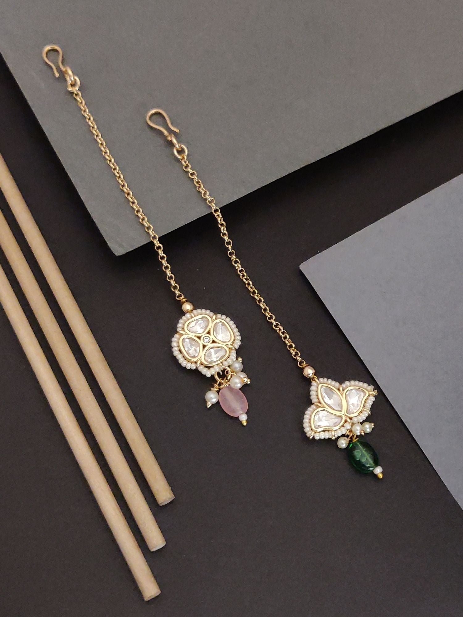 Set Of 2 Gold Plated Kundan Maangtikka with intricate designs and colorful embellishments