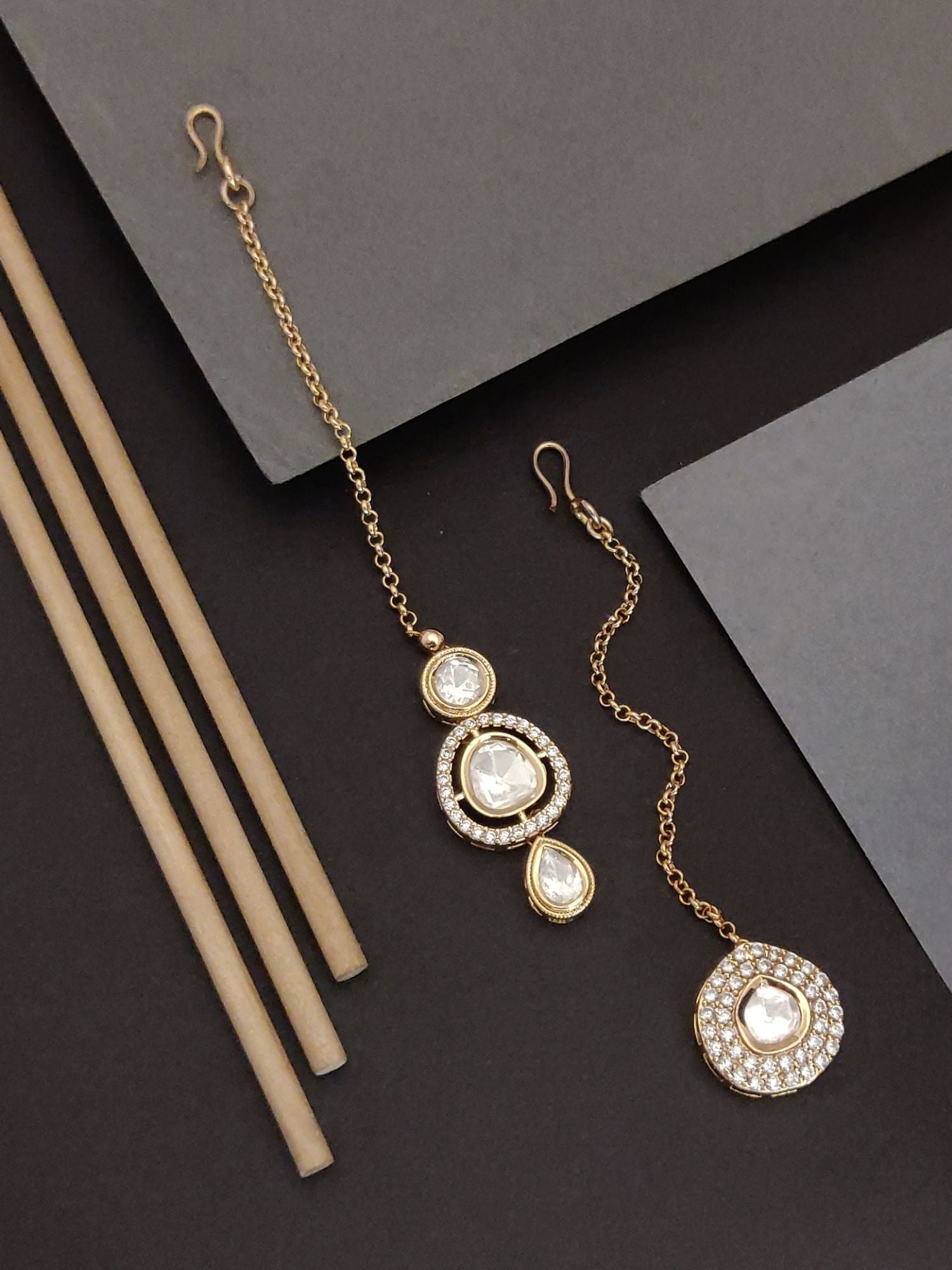 Set Of 2 Silver Plated American Diamond Maangtikka featuring intricate designs and sparkling embellishments