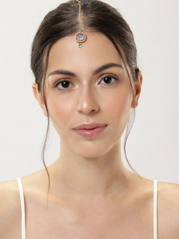 Elegant woman wearing a Set Of 2 Silver Plated American Diamond Maangtikka for a traditional look
