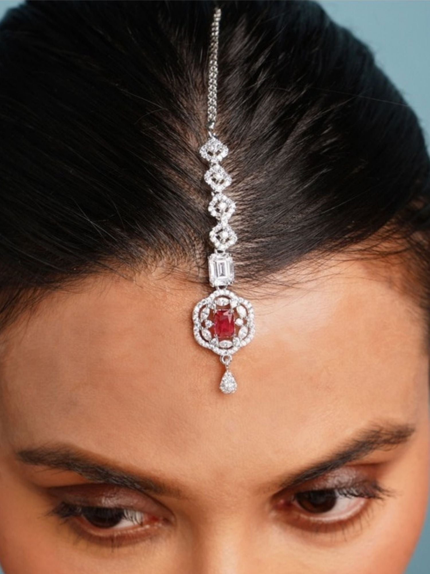 Set of 2 Silver Plated American Diamond Maangtikka with intricate design featuring ruby accents