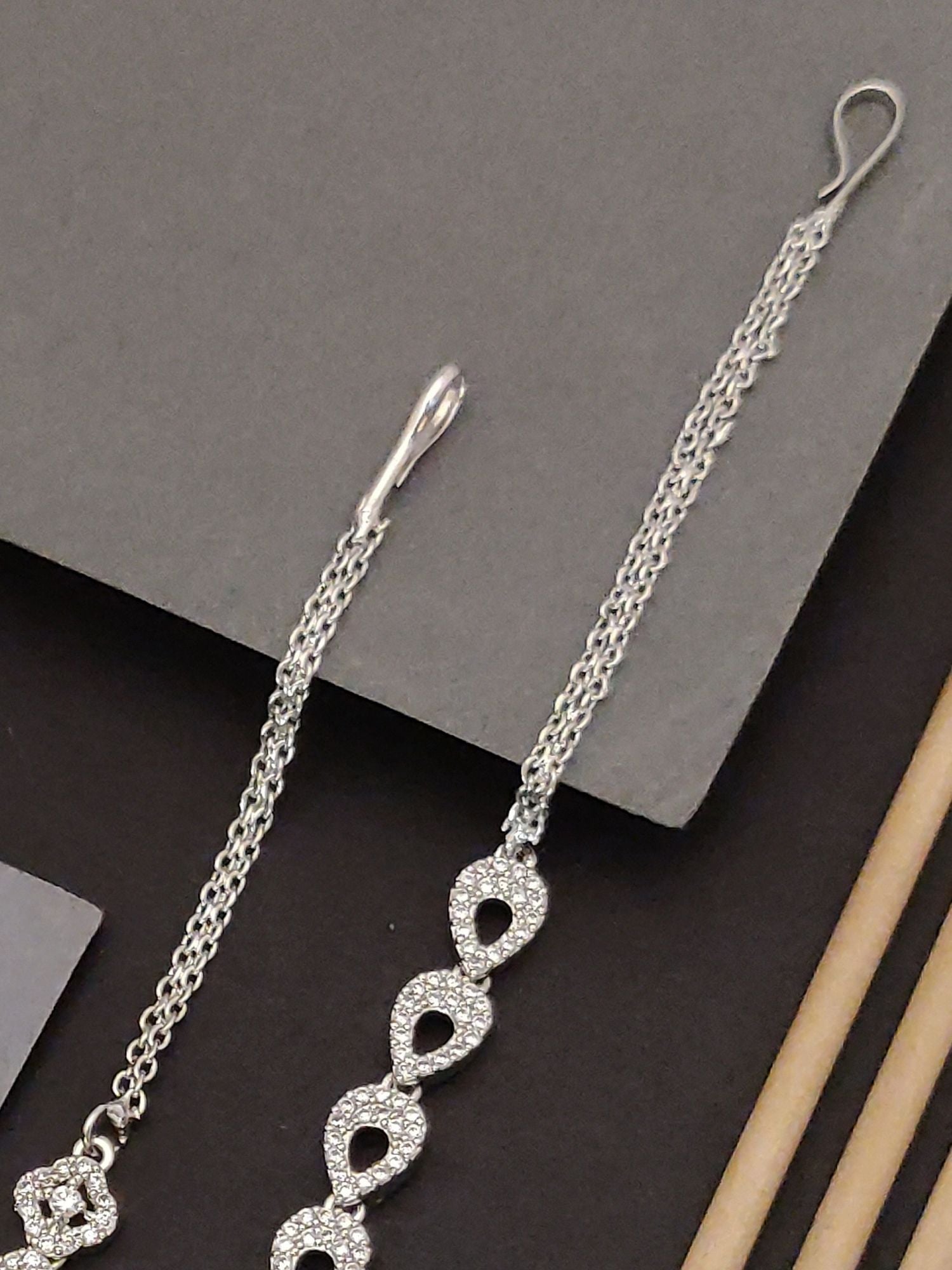 Set Of 2 Silver Plated American Diamond Maangtikka with elegant design for traditional outfits